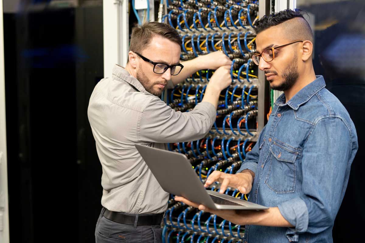 IT technician looking at cyber security platform