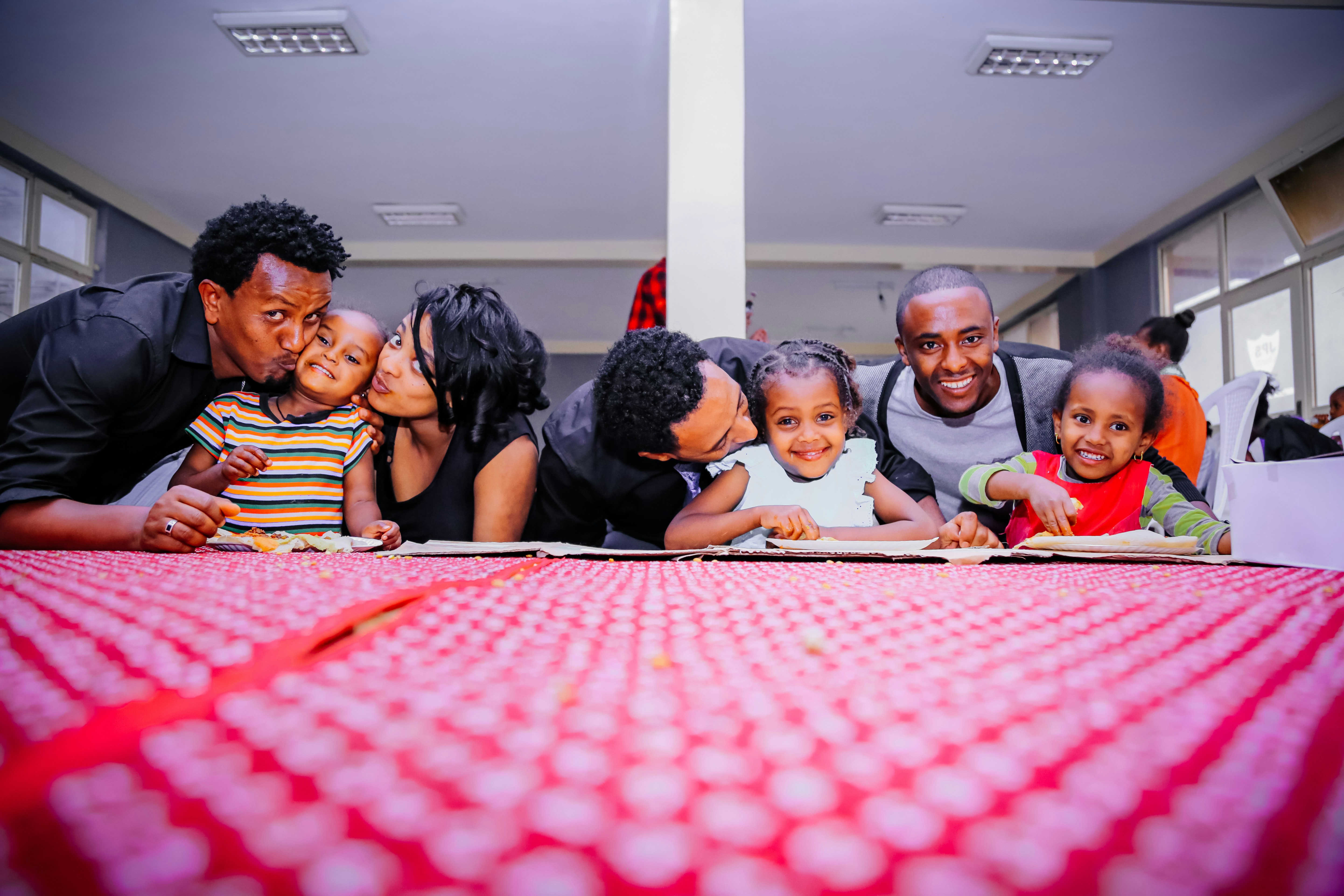 Family photo taken at a table