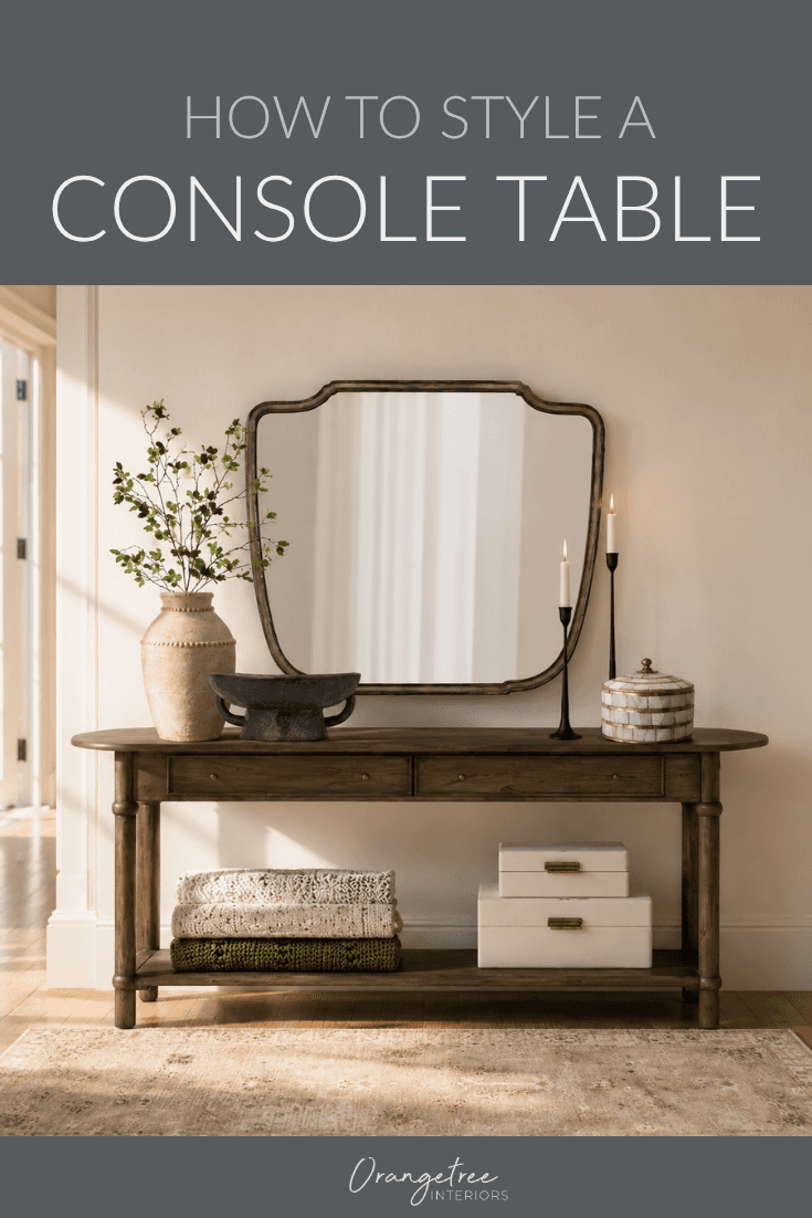 Vintage console table and entry design with brass mirror