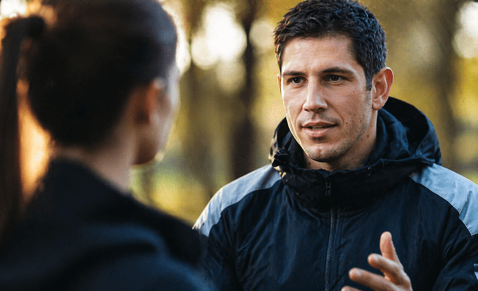 Coach explaining stuff to an athlete