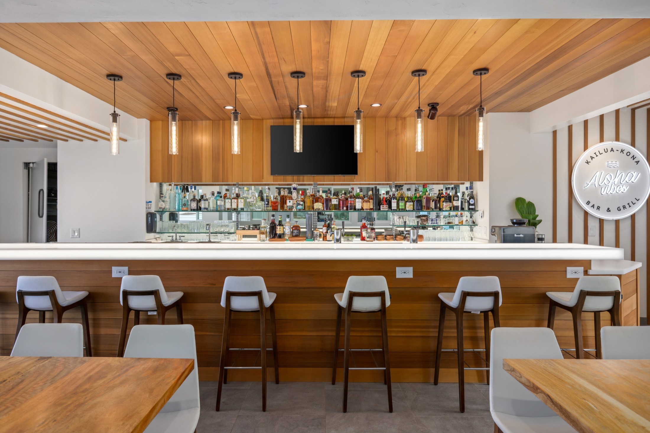 Bar with a wood-paneled ceiling and pendant lights, Aloha Vibes, Kailua-Kona