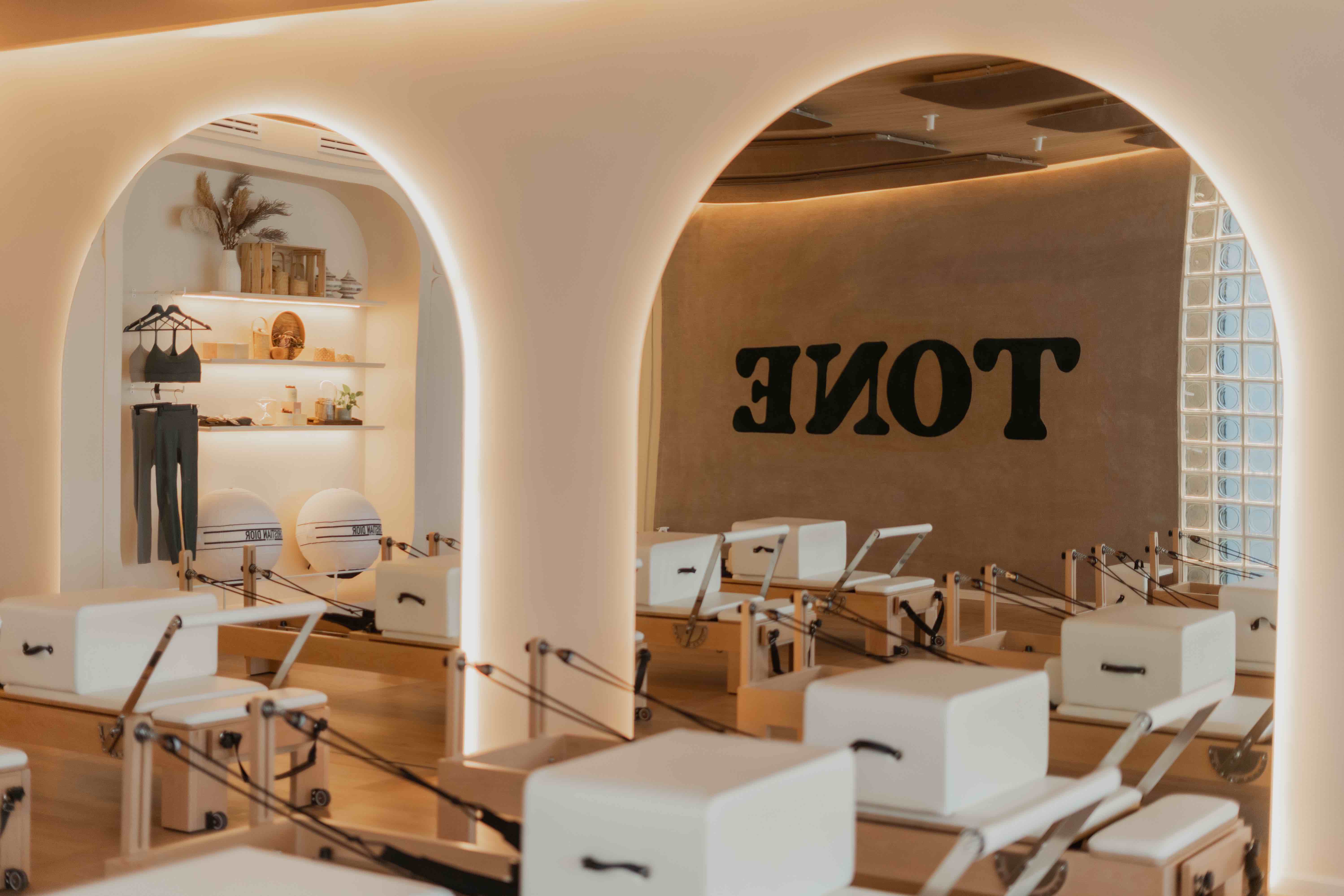 Tone TTDI reformer pilates group class studio mirror