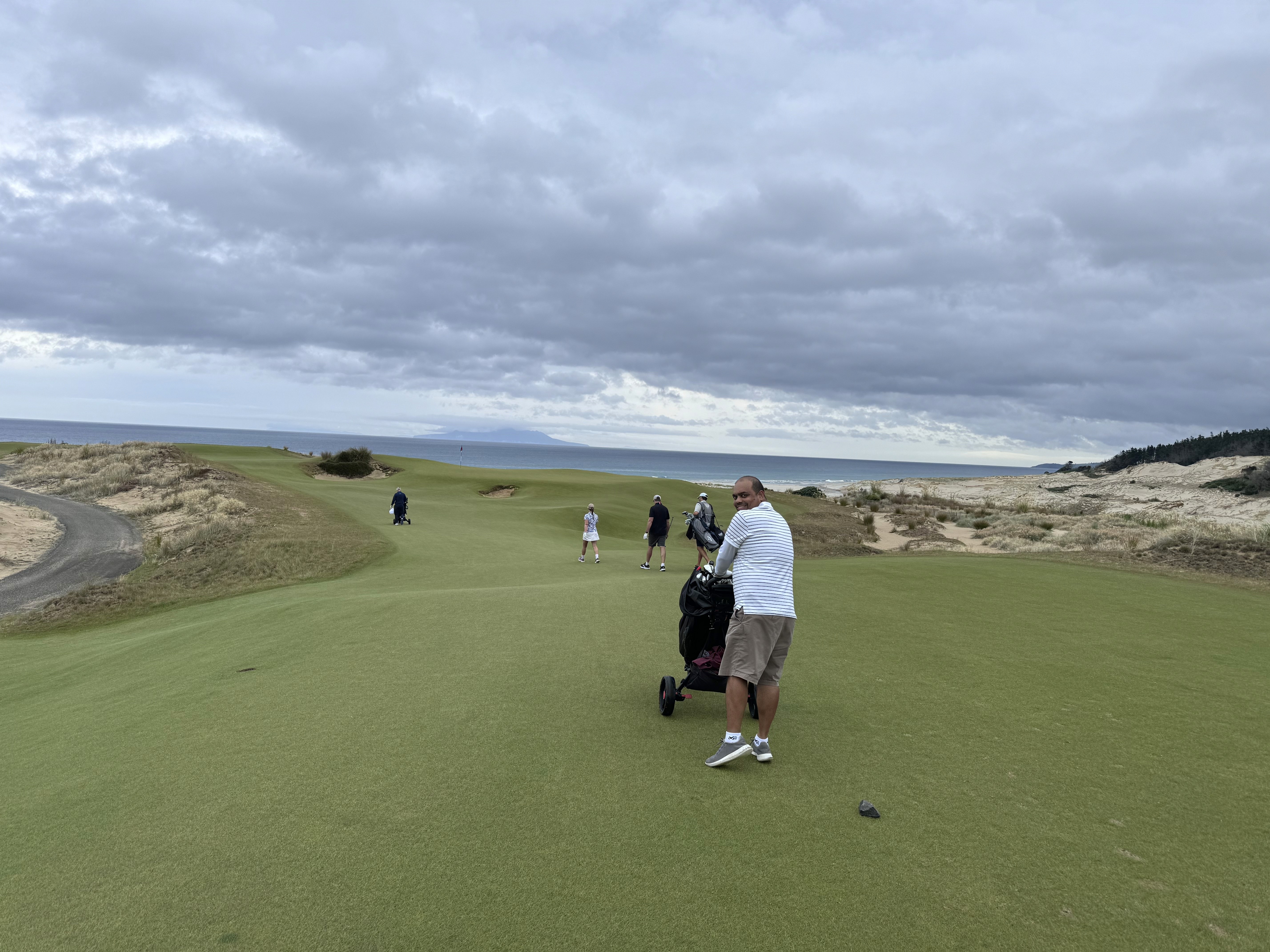 Te Arai Links, walking along with the group