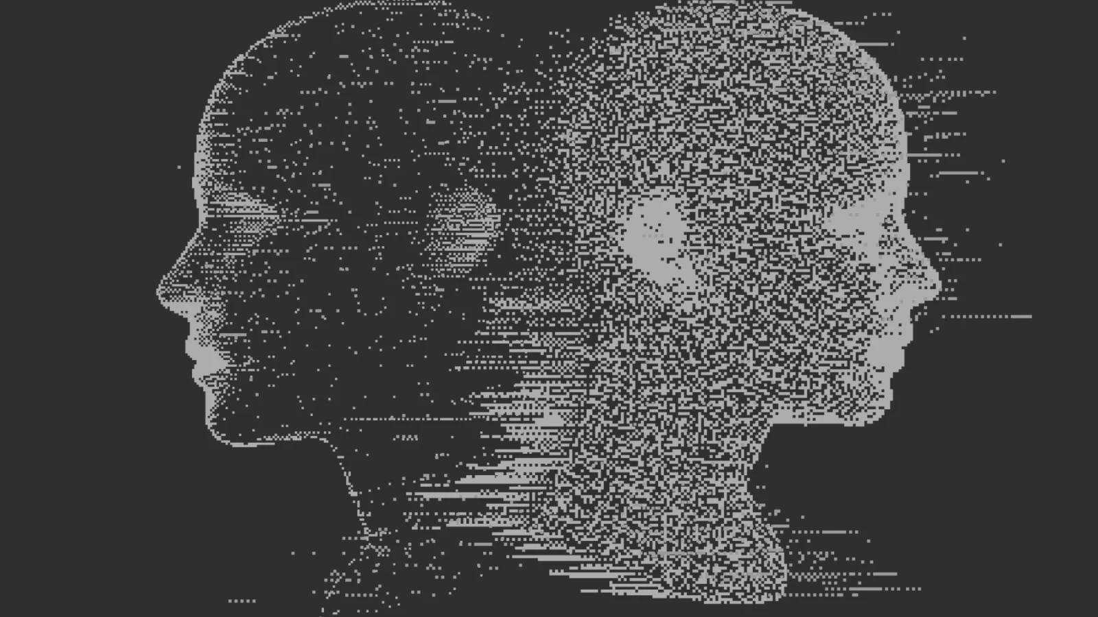 Modern office building with large windows reflecting a vivid orange sunset sky, silhouetted figure visible through the glass.