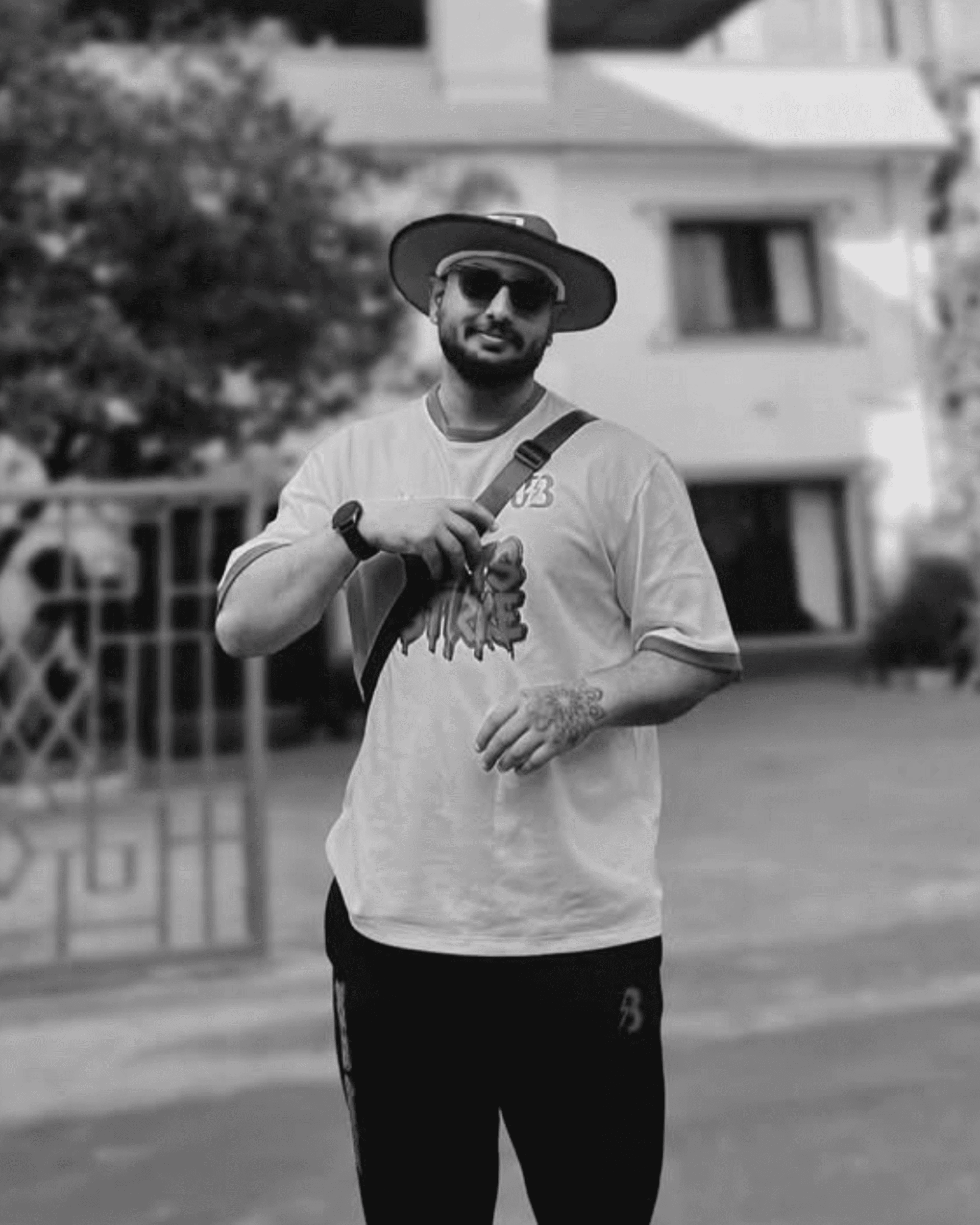 a blurry photo of a person standing in front of a wall