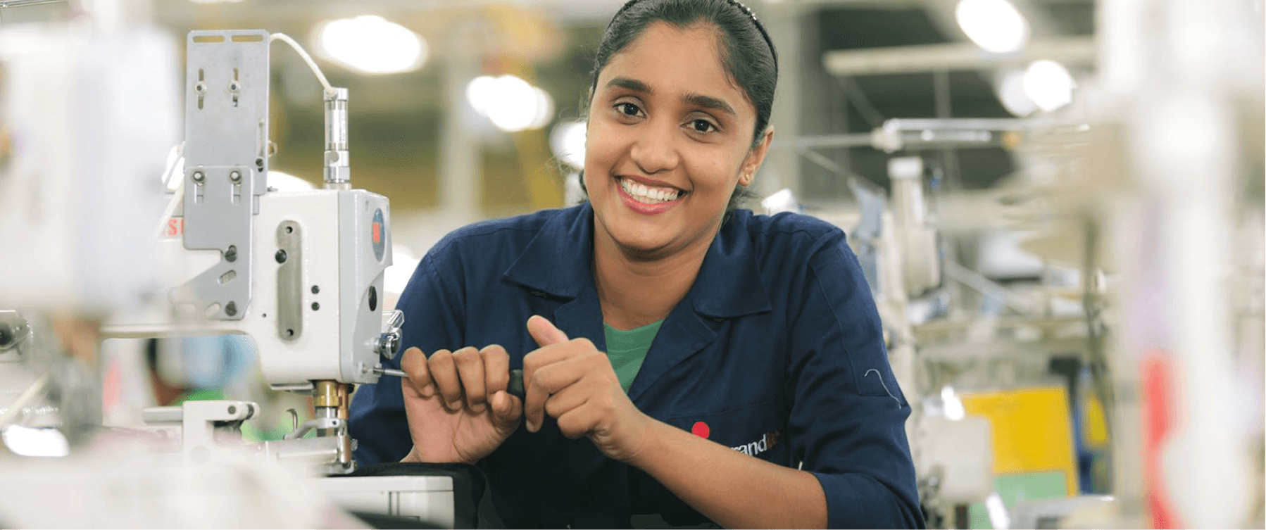 A smiling Brandix employee 