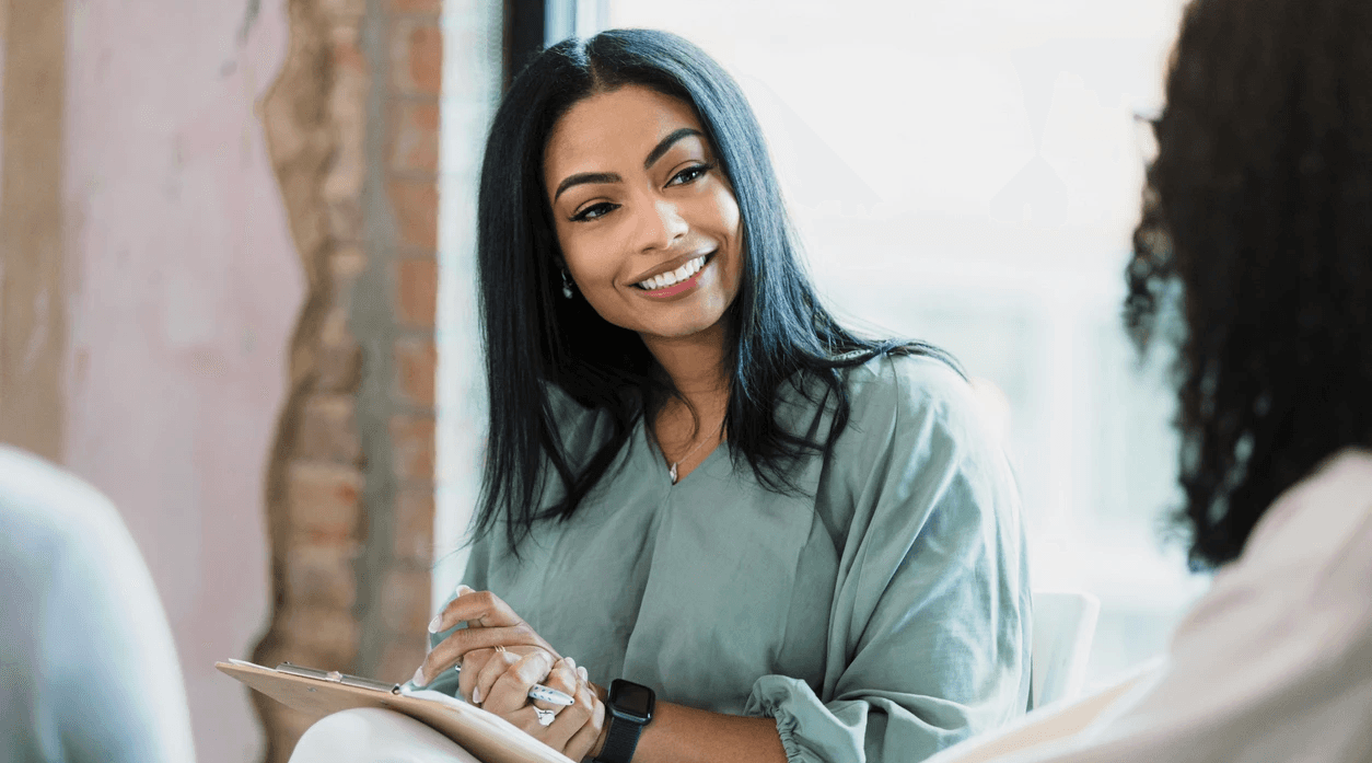 Woman sharing value proposition in a healthcare business meeting