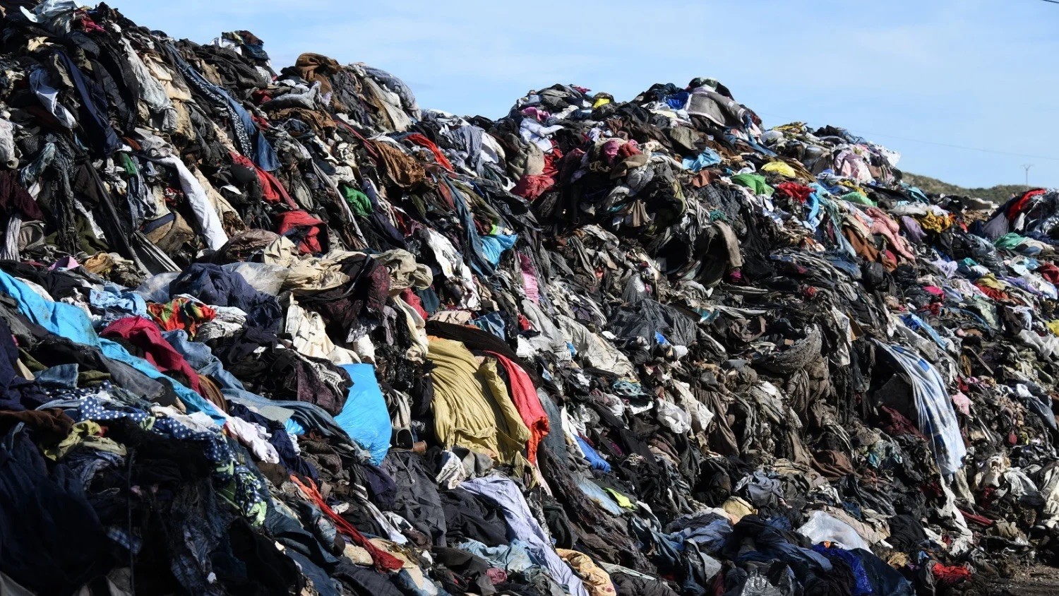 A pile of discarded clothing by fast fashion brands