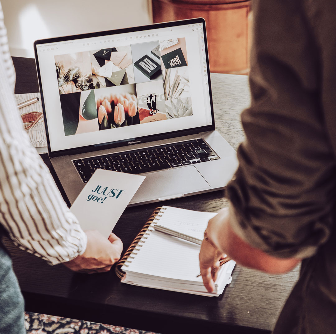 Woman standing in front of a white modern car in a futuristic bulding
