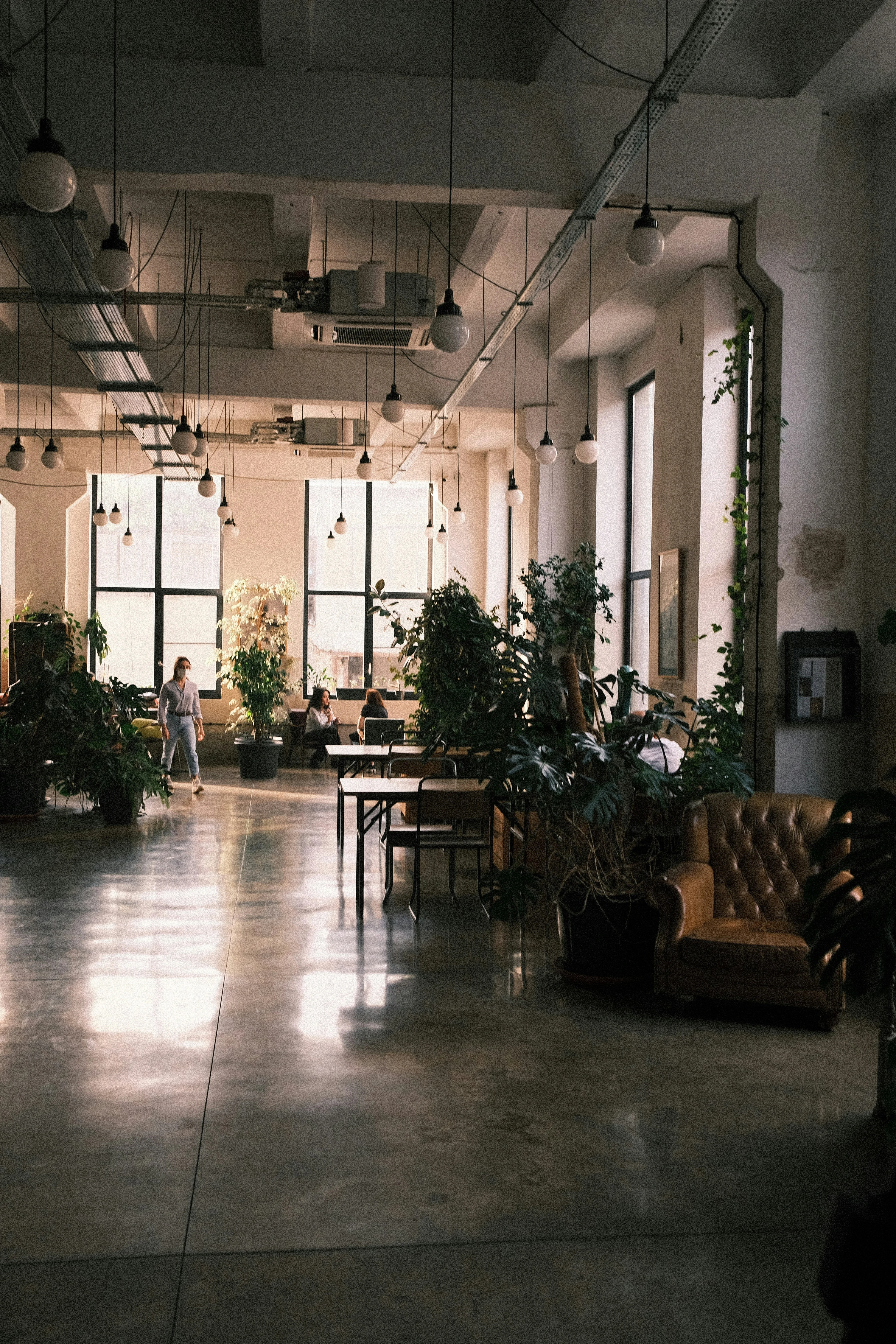 a room filled with furniture and a large window