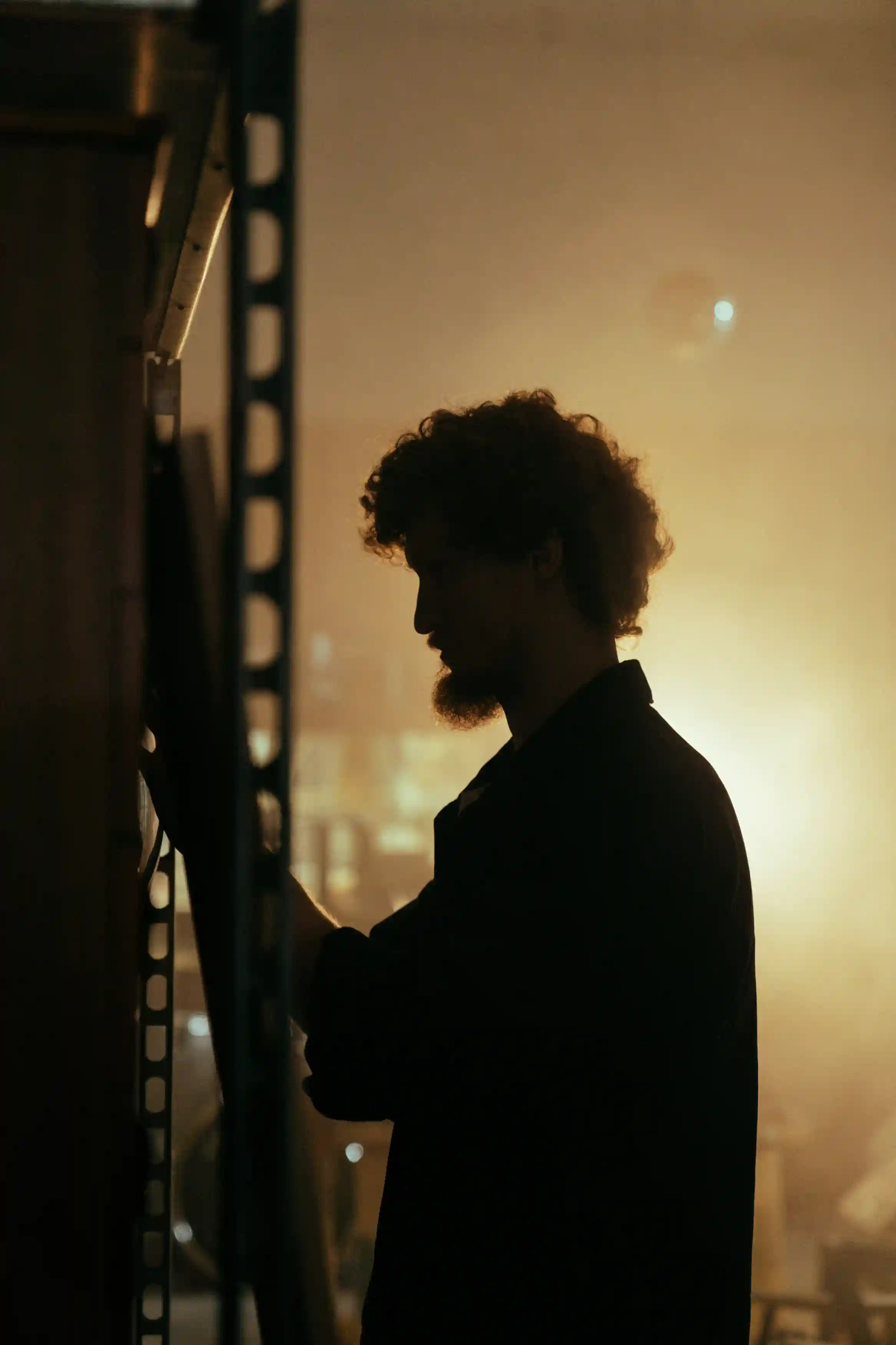 A side profile of a factory worker in a factory