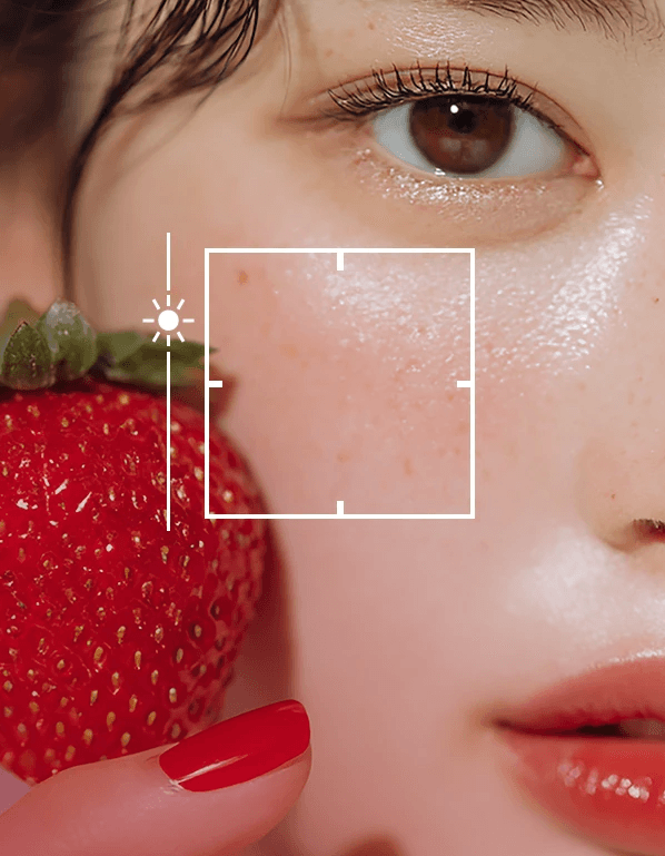 Strawberry and woman's face close-up