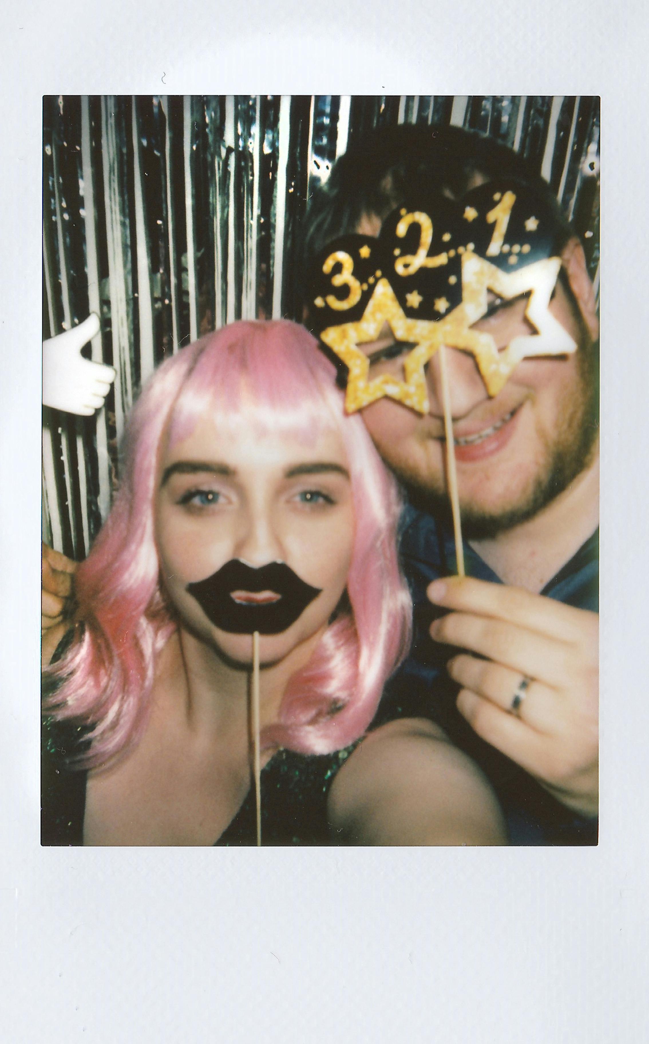 cheerful-adults-at-a-new-year's-eve-party,-posing-with-fun-masks. - lisa-from-pexels (pexels)