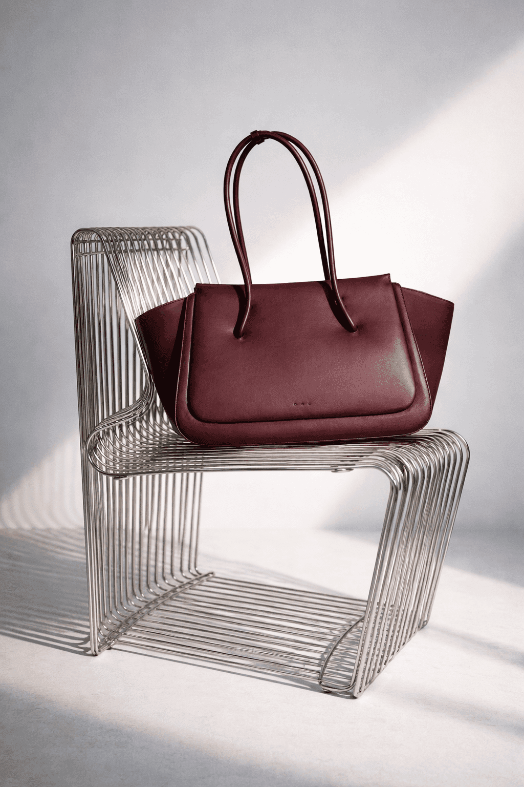 Black and white photo of man posing on camera