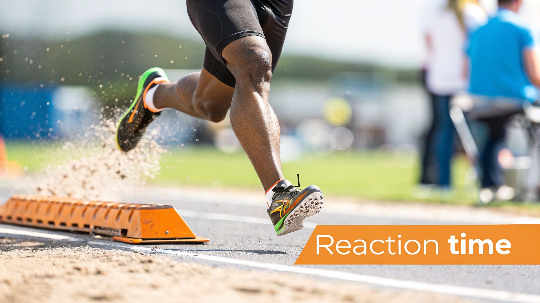 A track and field athlete's legs and feet exploding off a starting block, kicking up sand, with 'Reaction time' text.