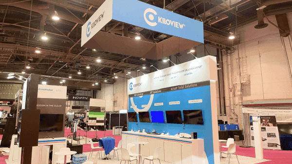 Kiloview NAB Show 20x20 booth with screen-based broadcast display, product demo counters, overhead branding, and compact visitor flow layout
