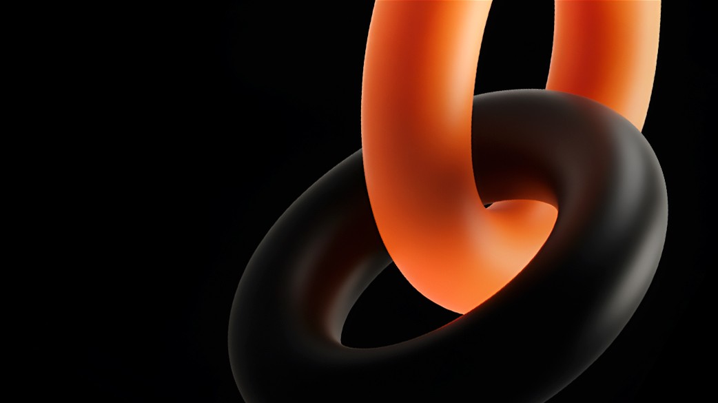 검은 배경 위에 서로 연결된 오렌지와 검은색 링 형태의 3D 오브젝트