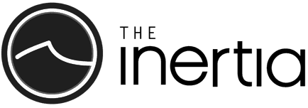 The Inertia logo with a black circle and a white wave symbol on the left.
