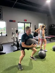 man in black hoodie standing