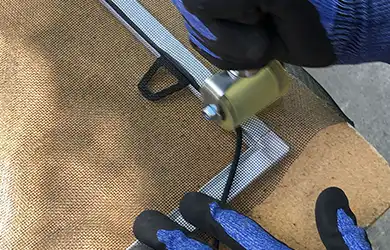 A detailed look at our window screen craftsmanship — frame and spline setup in progress.