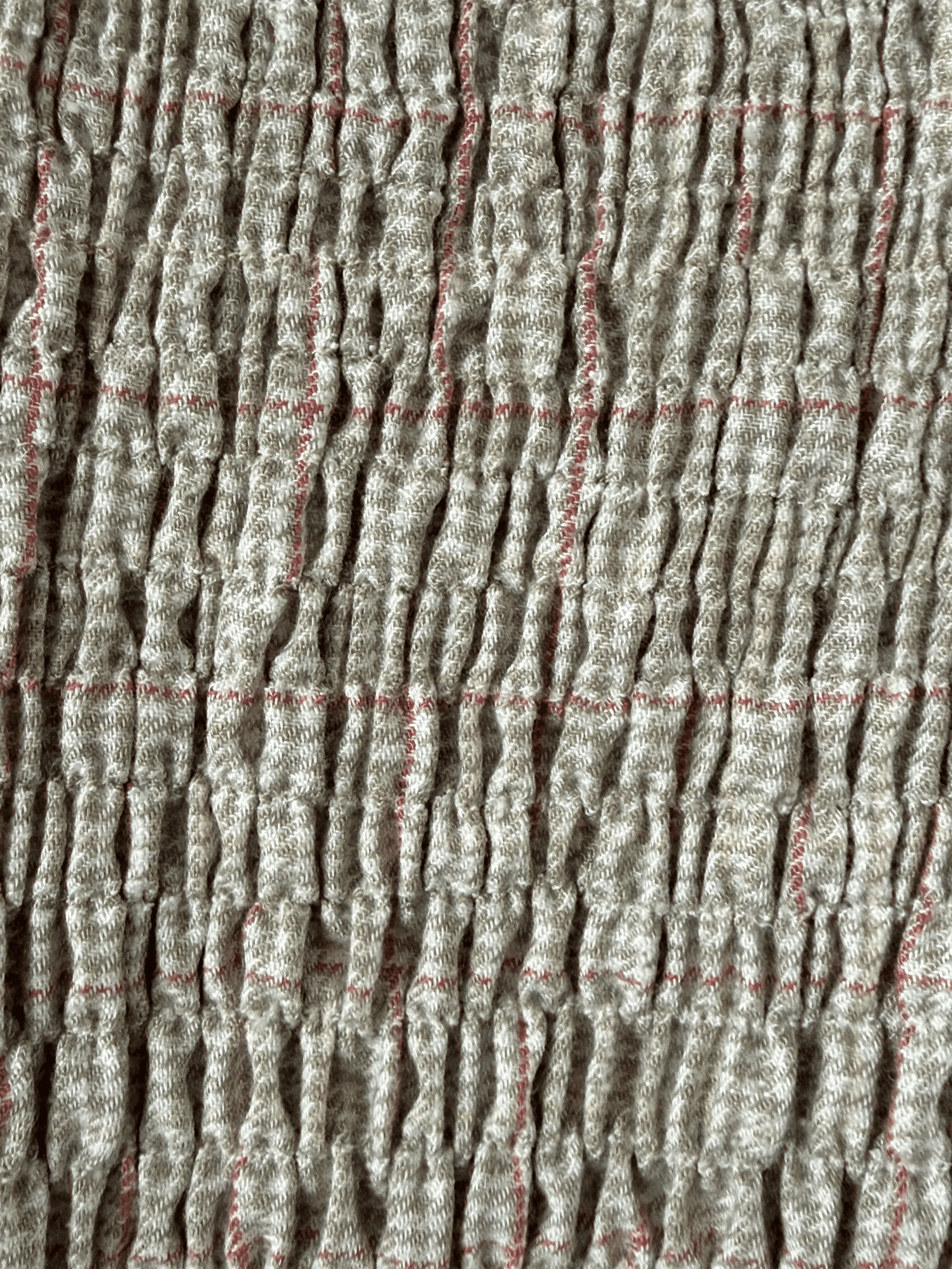 Close up of rushed cream top