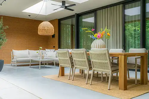 Cozy Sevilla COCO patio set with comfortable seating and natural decor.