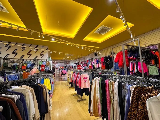 Group of men standing with Sufboard