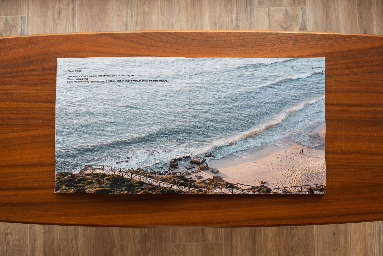 the book with a full page spread of the beach
