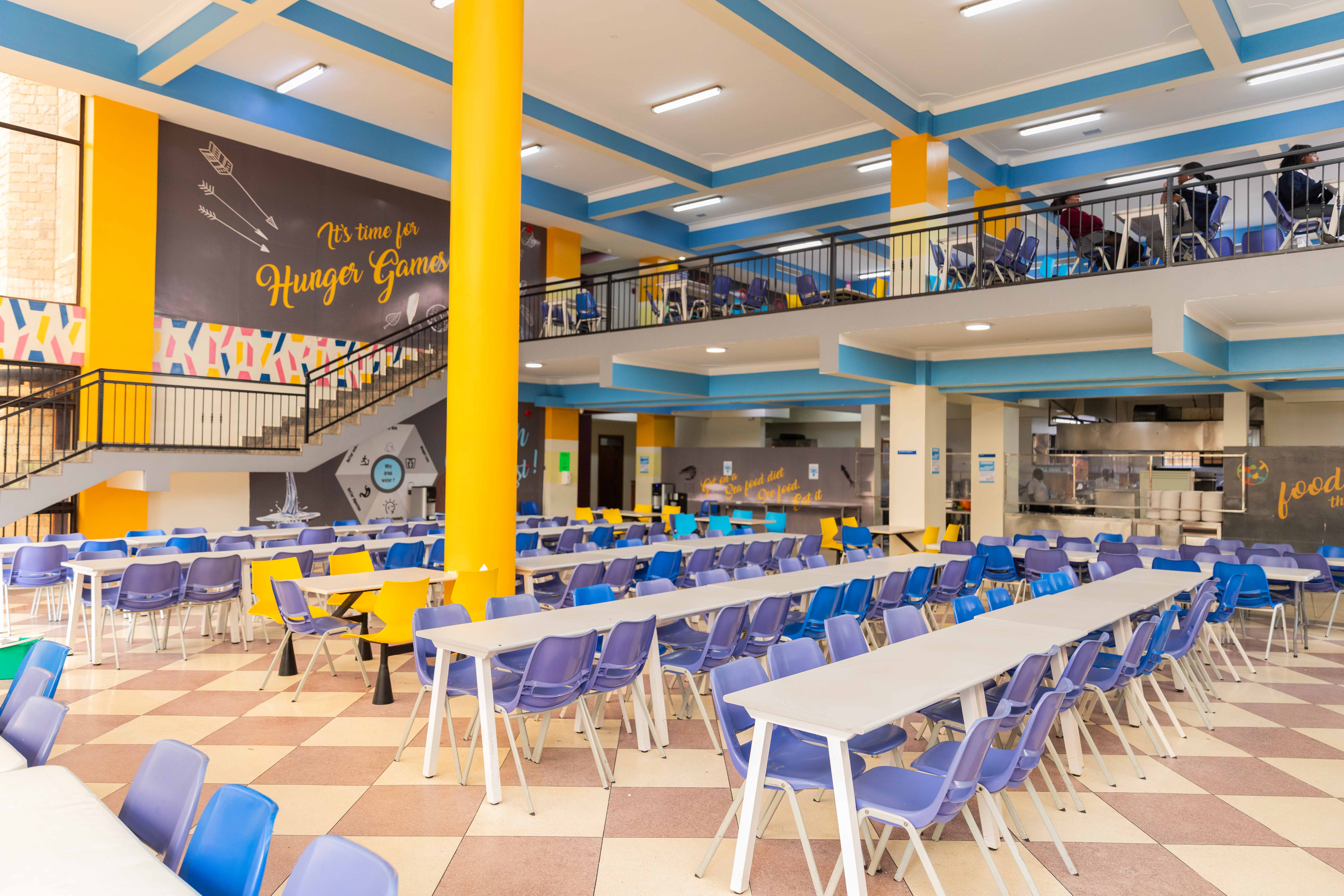 A schoolgirl participates in an online lesson using a tablet