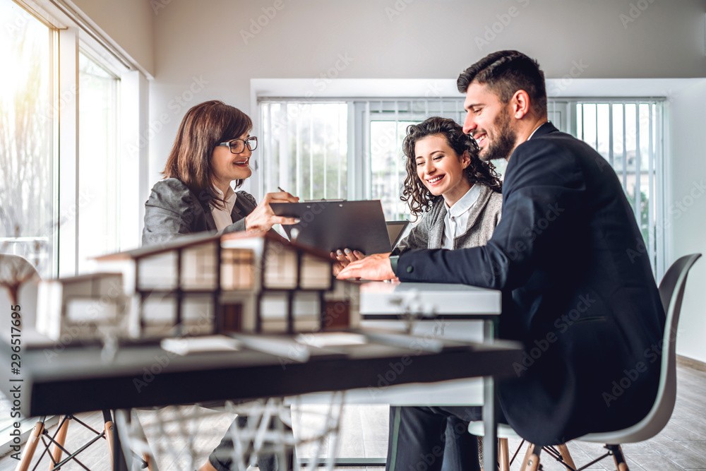 A financial meeting takes place at a family office.