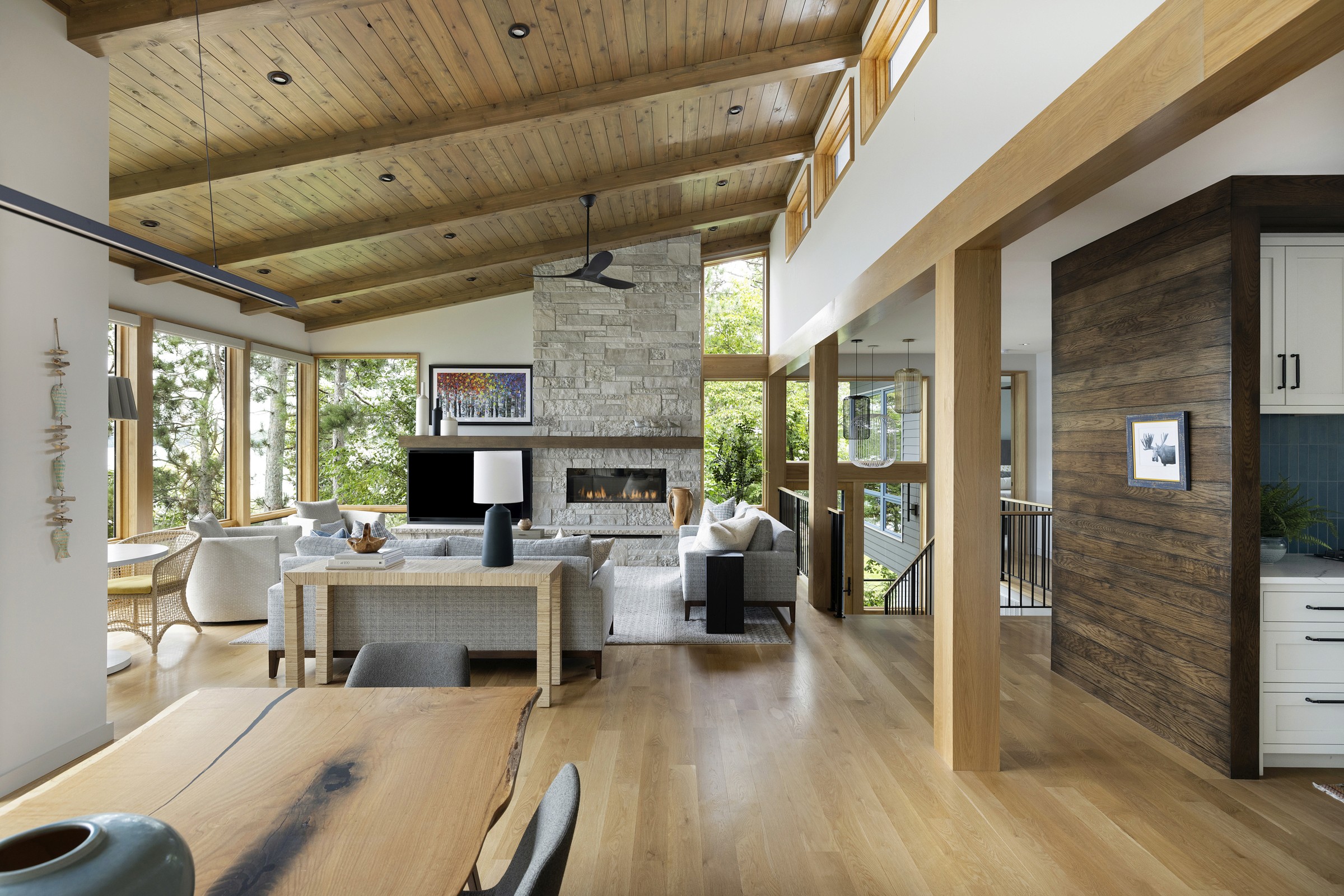 Sand Lake Cabin Charleston - Interior living space with wood accents, natural light, and open layout by Renae Keller Interior Design
