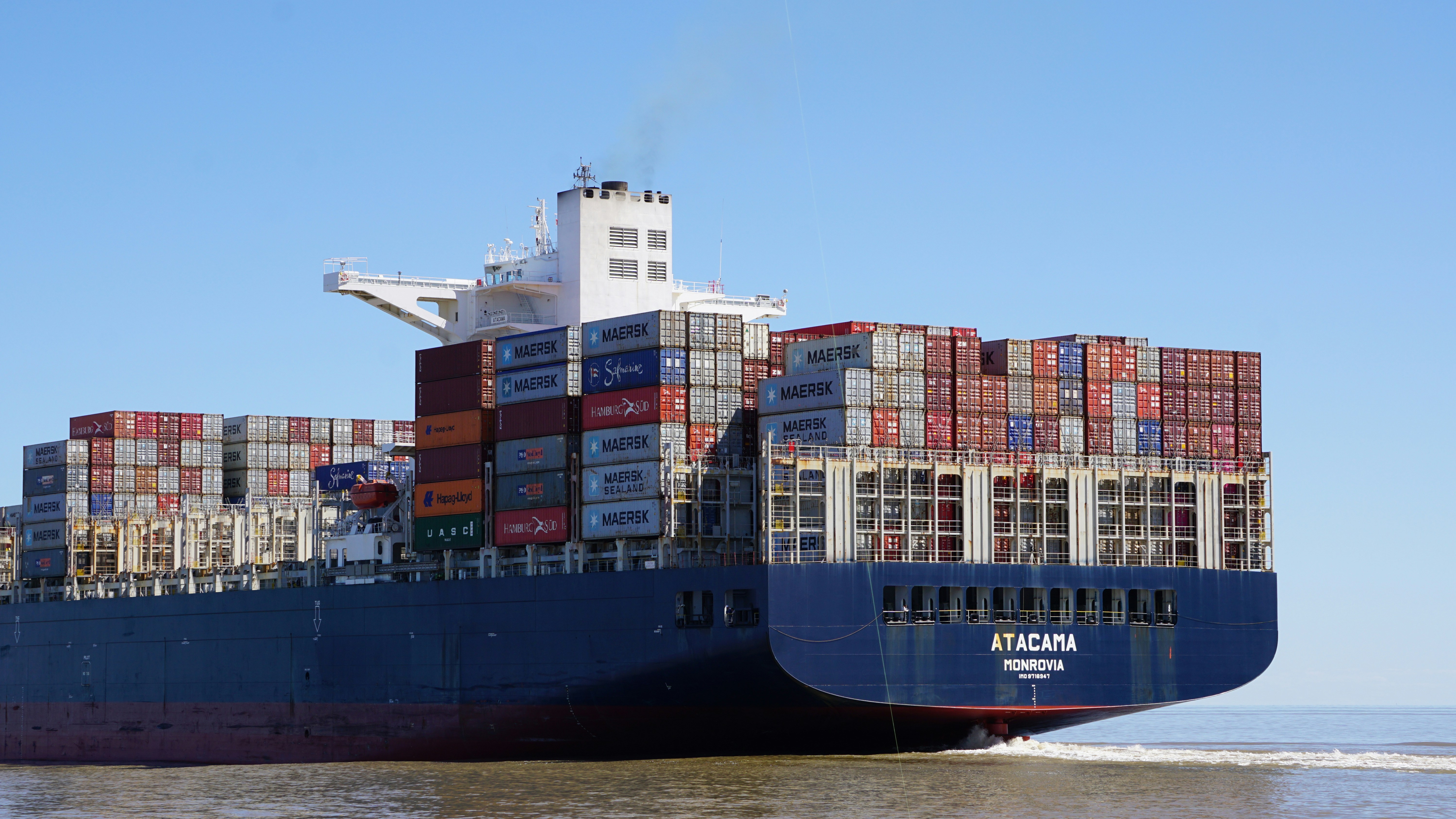 a large cargo ship carrying containers