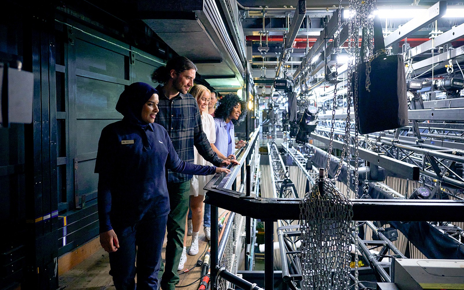 Group of tourists enjoying a Guided Back Stage Tour of Sydney Opera House, exploring the iconic architecture in Sydney, Australia