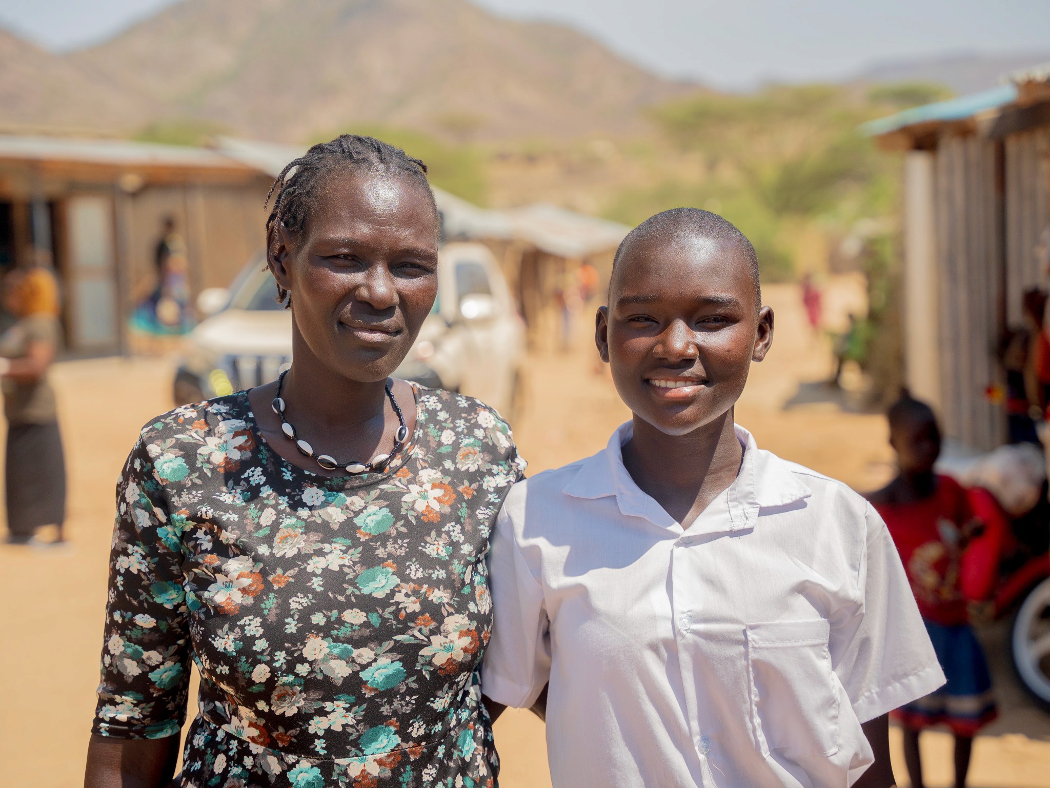 a black and white living room with a large tv