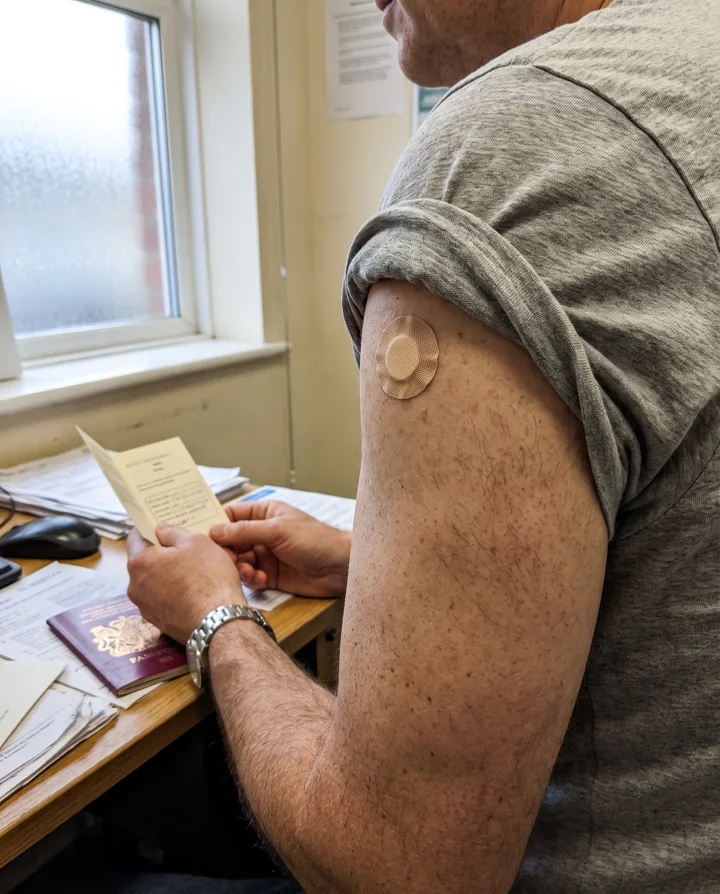 Plaster and vaccination record after a travel appointment