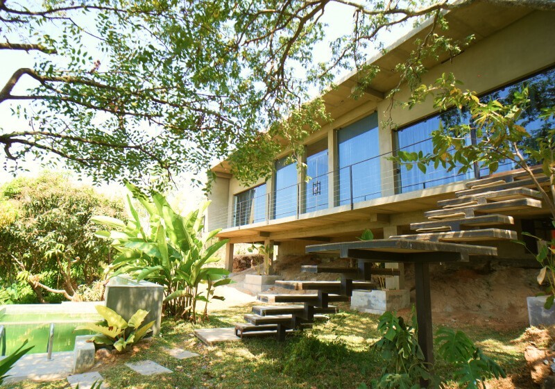 A flower-filled ring floats in fluffy clouds.