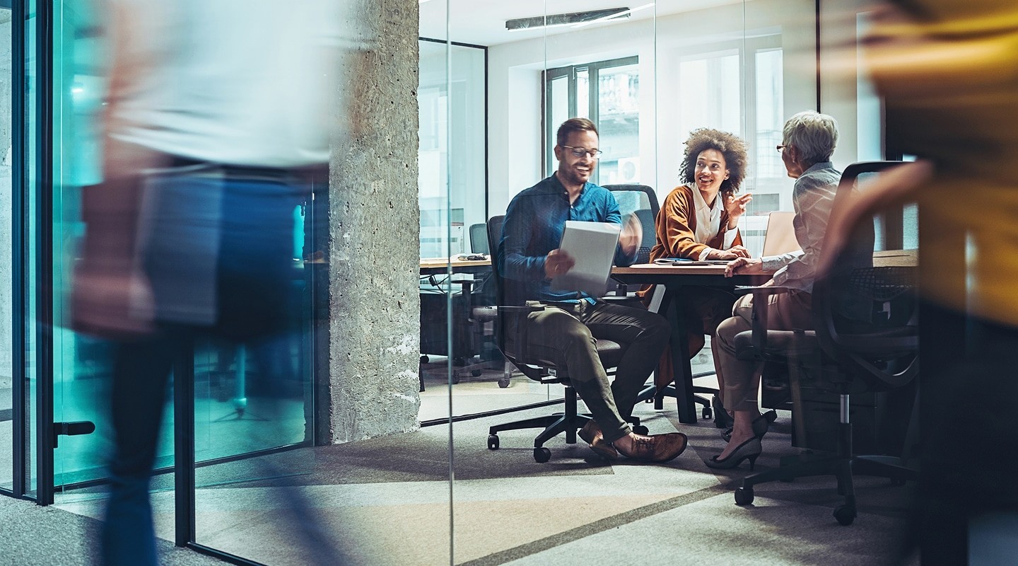a blue and pink background with a circular object in the middle