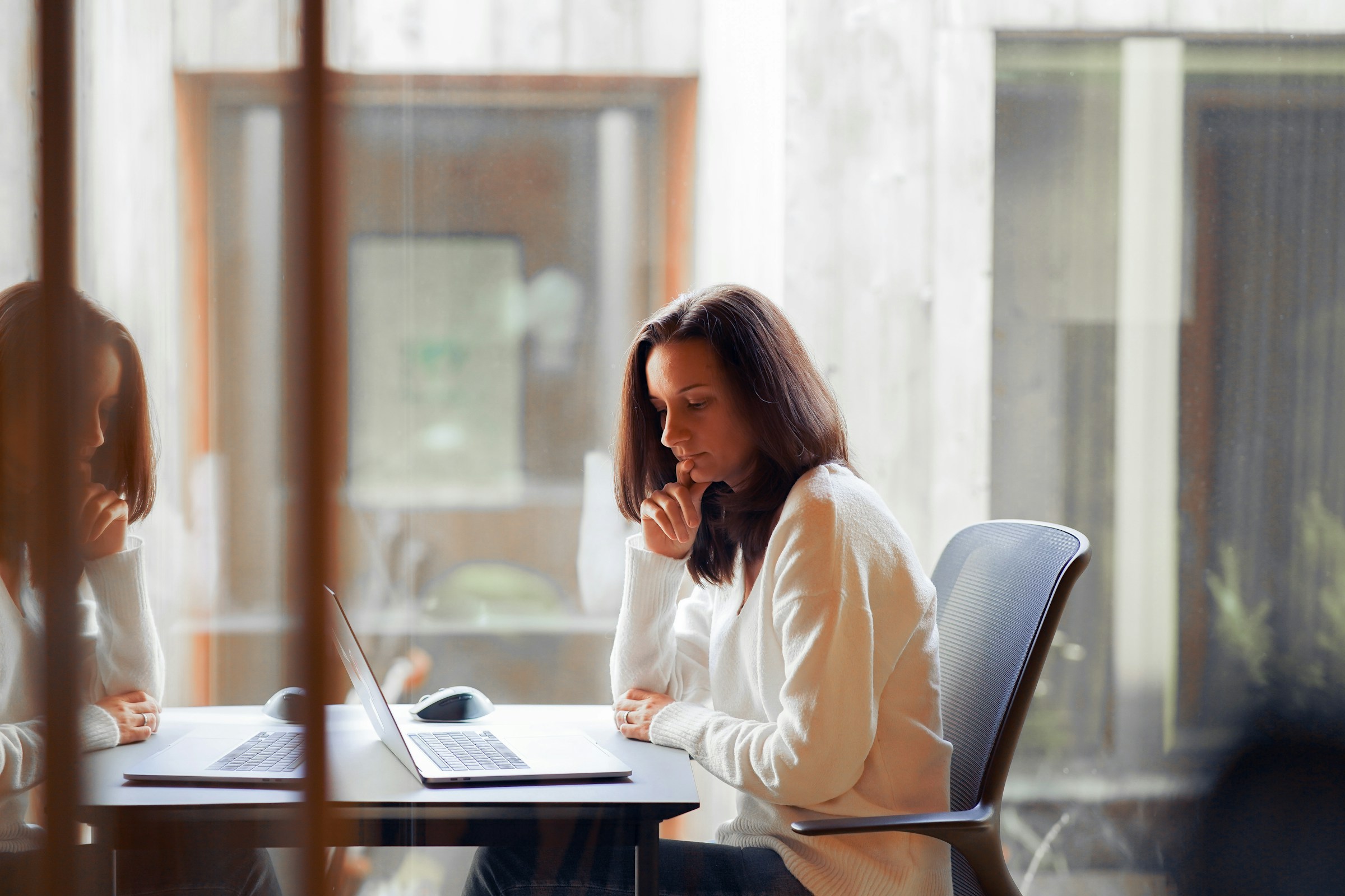 woman sitting alone and working - Research Project Graphic Organizer