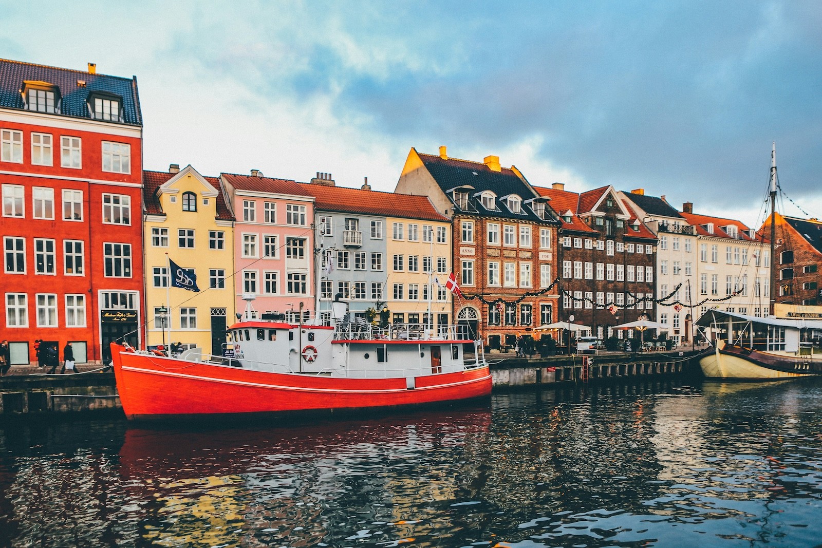 Copenhagen canal with a red boat