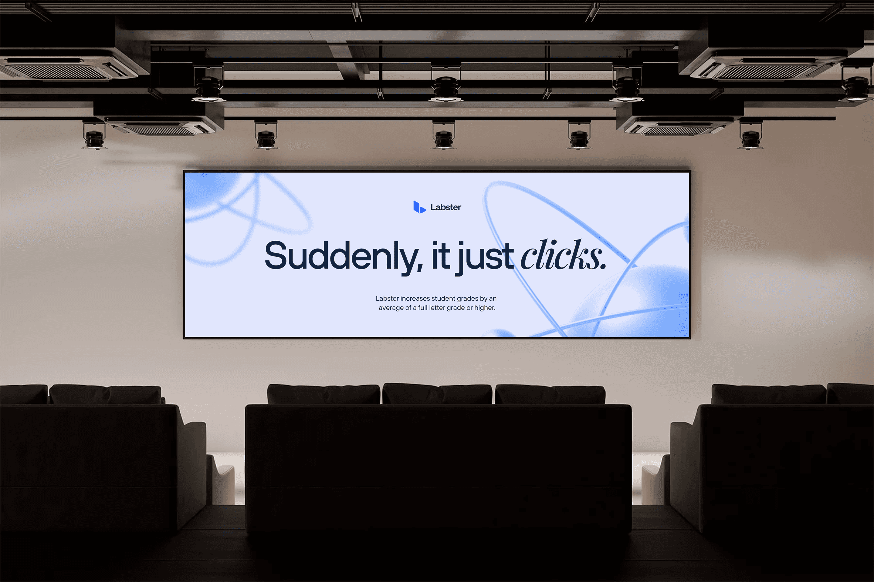 Mockup of large display in a conference hall showing a slide using the new Labster brand.