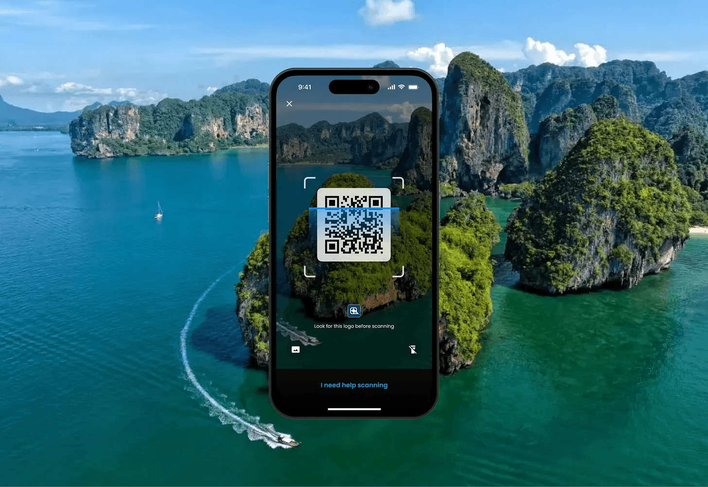 a hand holding a coin in front of a machine