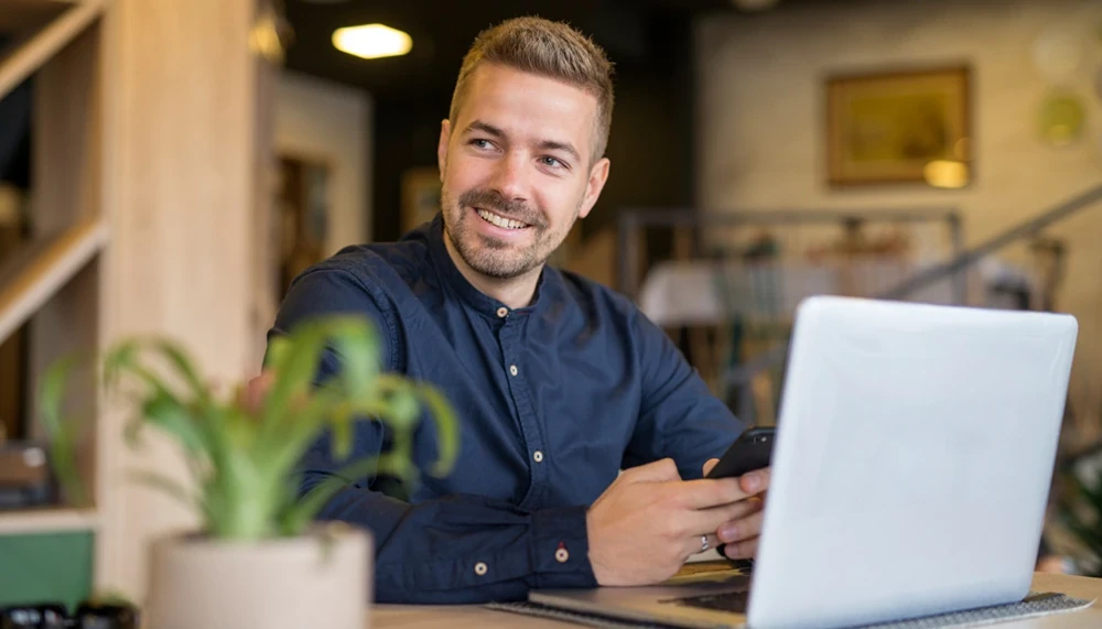 A man working at a laptop