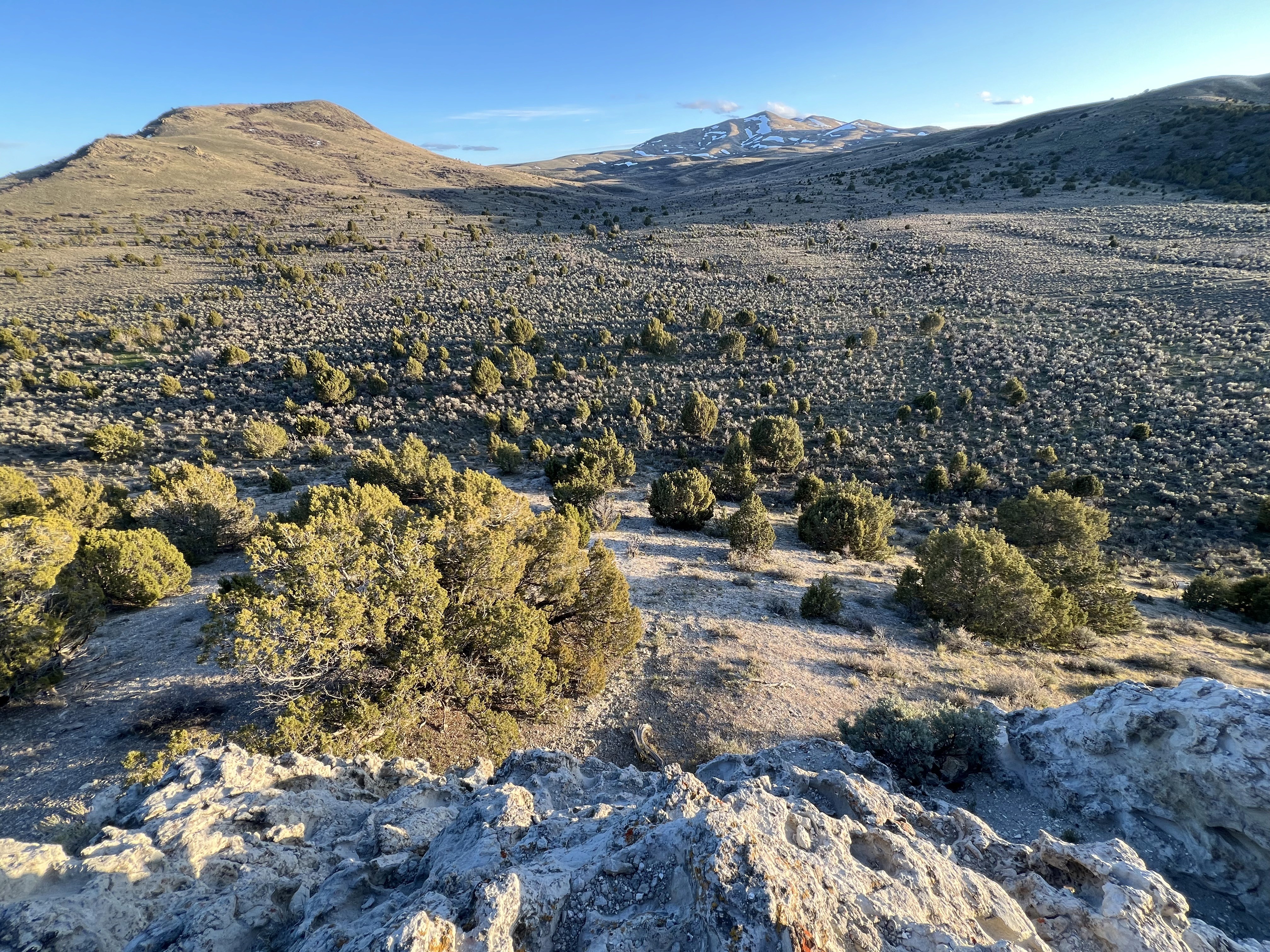 a large truck driving down a dirt road