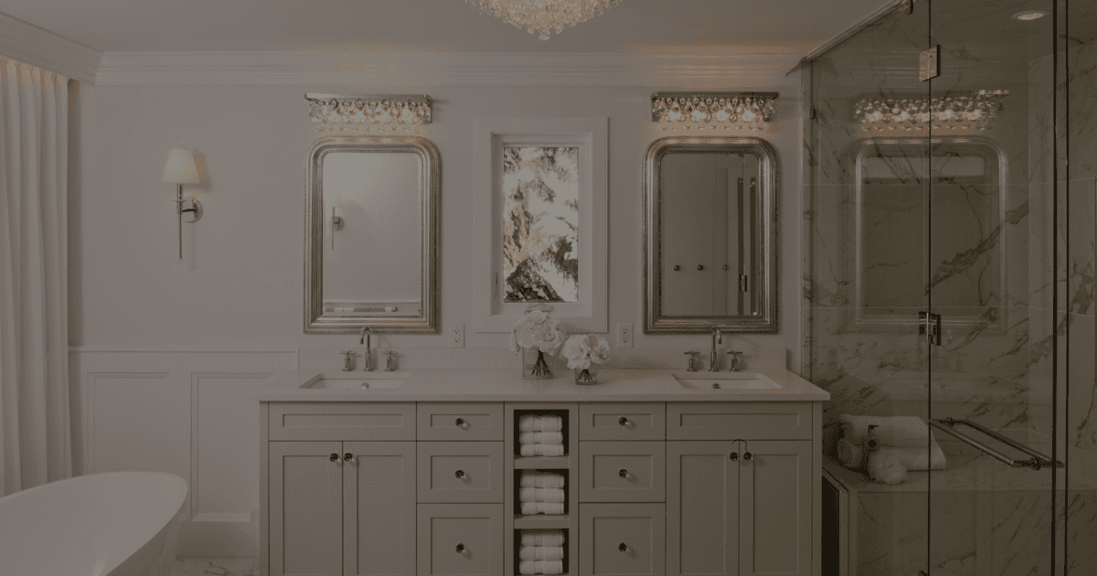 A grey bathroom with glamorous sparkly lighting.