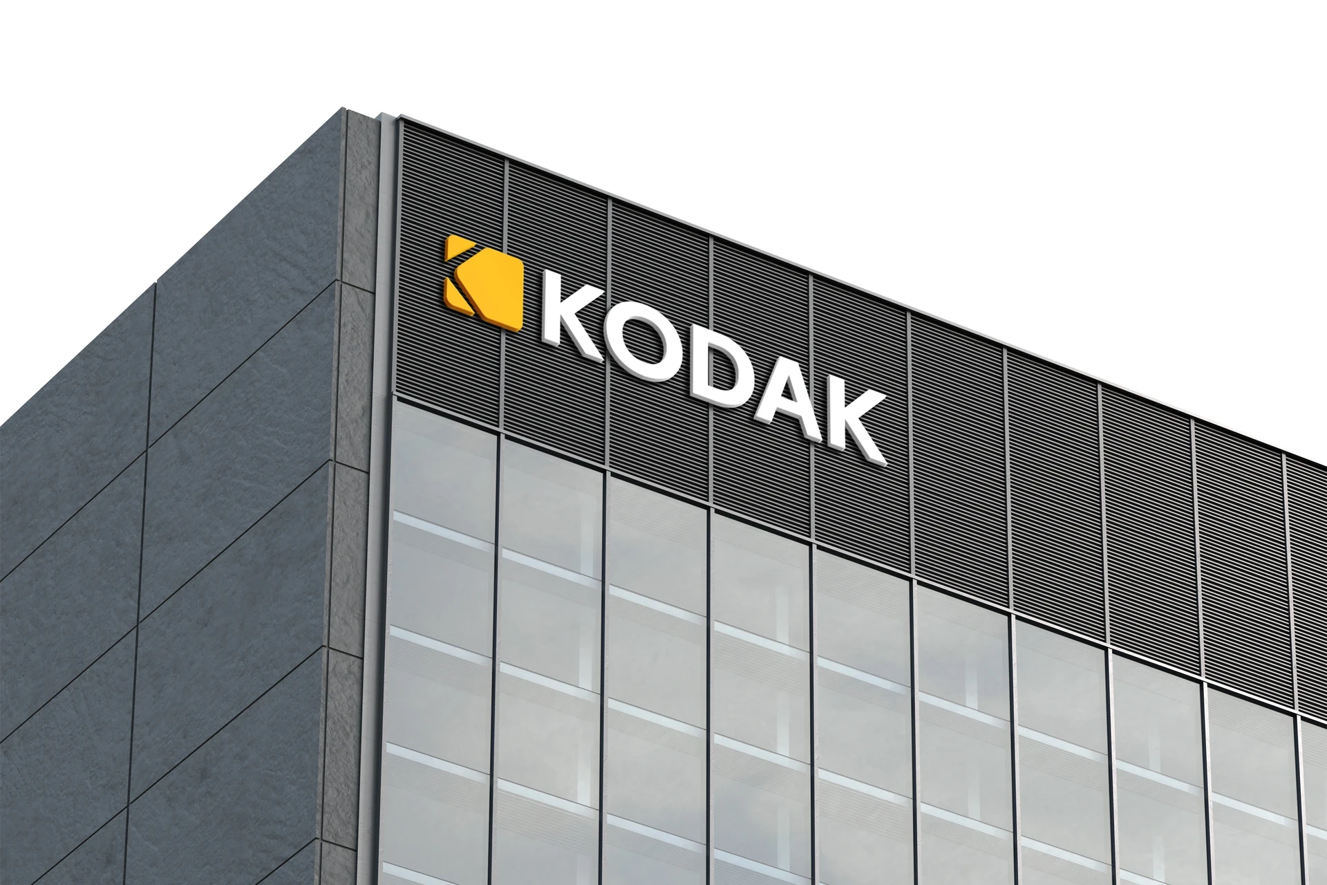 Large KODAK sign displayed on the side of a modern urban building, symbolizing the brand's legacy in photography.