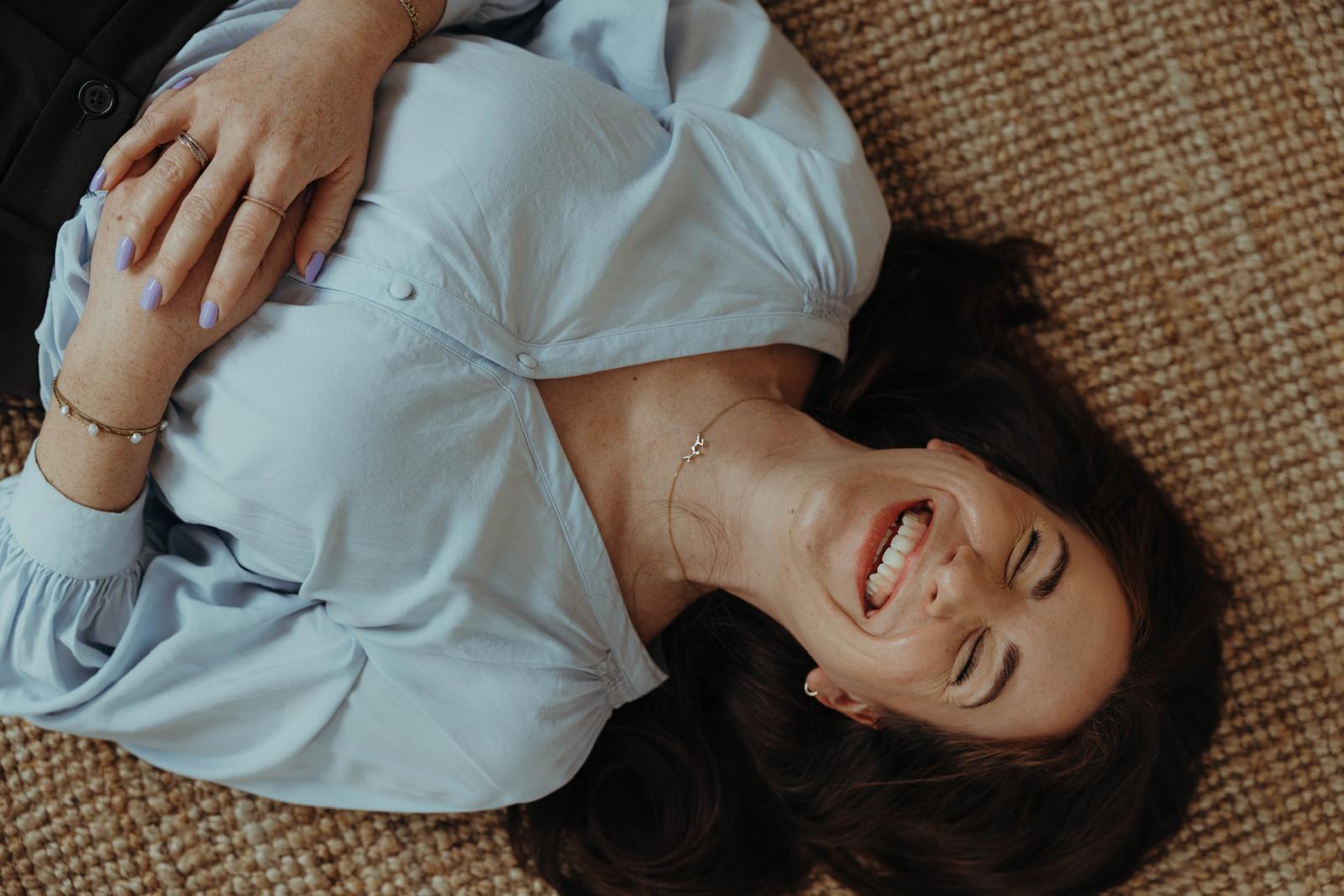 upward angle of woman against a blue sky