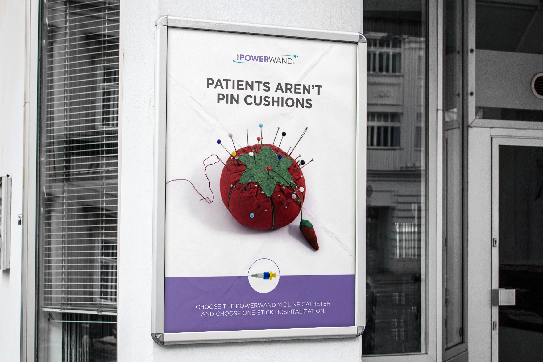 An Out of home poster for a Medical Device product called Powerwand. The design features a pin cushion with the headline “Patients aren’t pin cushions”.