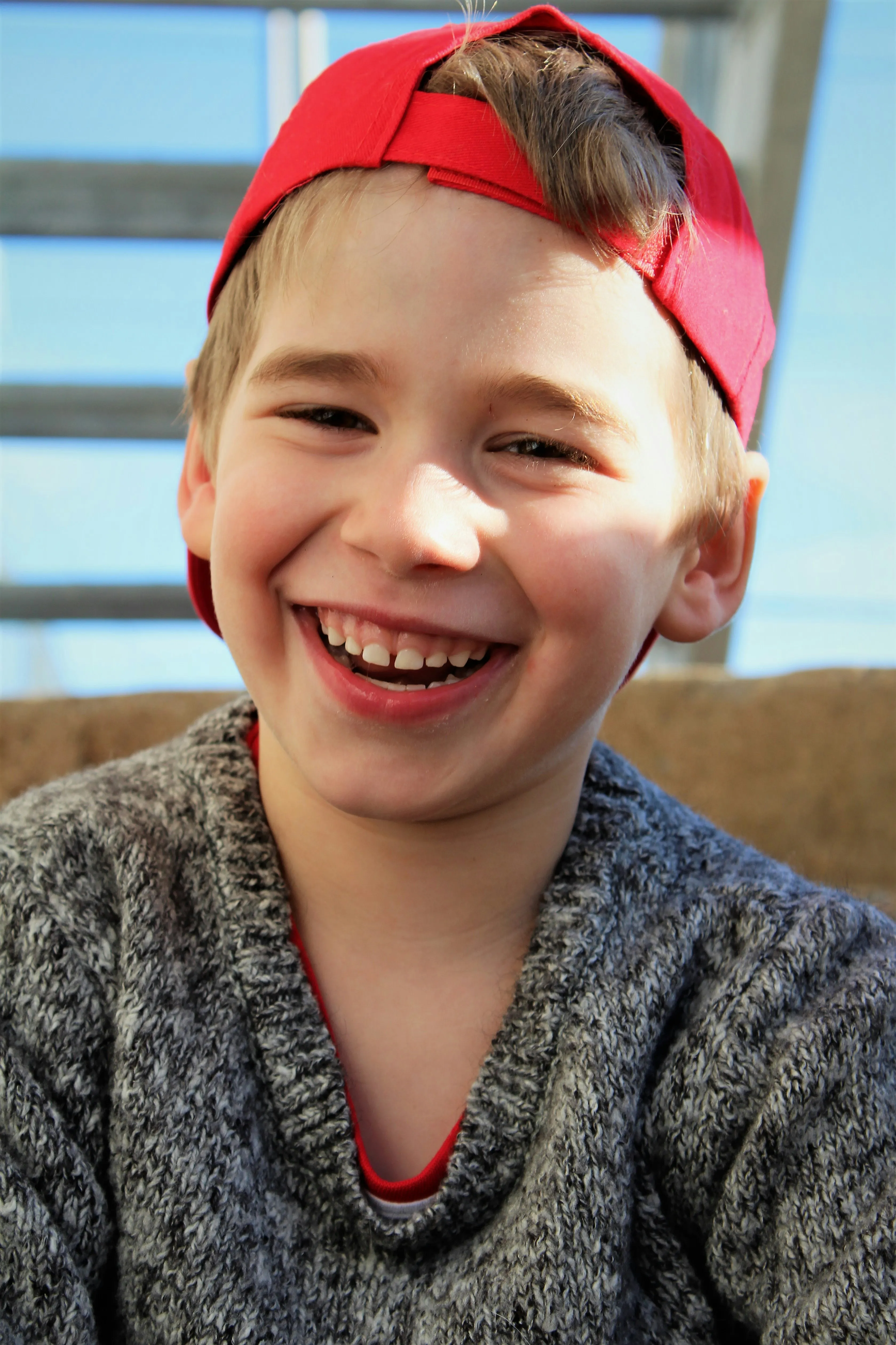 Smiling child after receiving pediatric dentistry at Midtown Dental Studio on Eglinton in Midtown Toronto, Ontario | Best Dentist in Midtown Toronto, Ontario