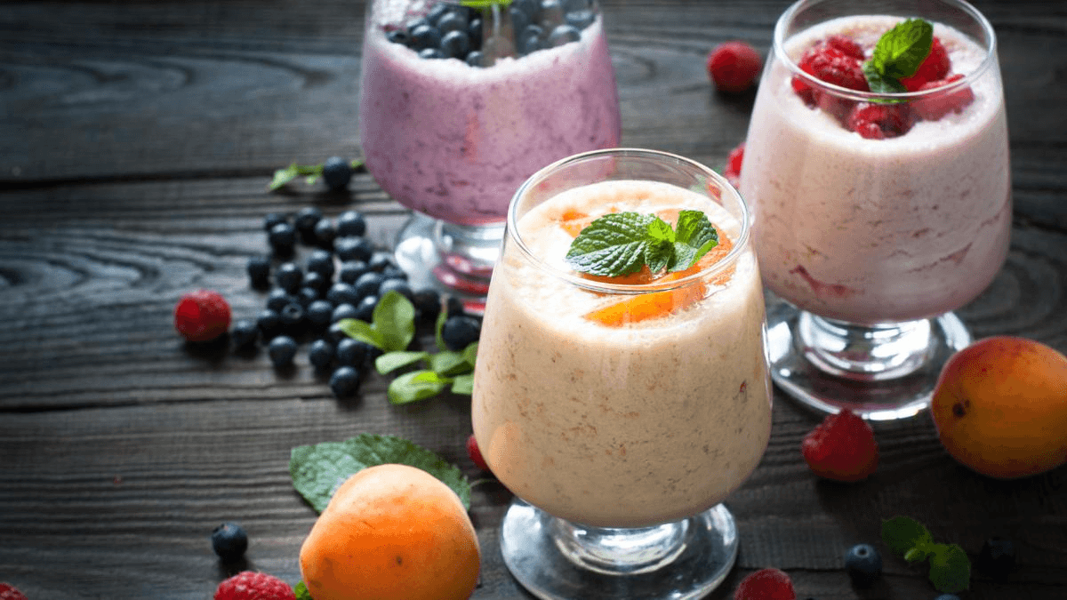 the eiffel tower is lit up at night