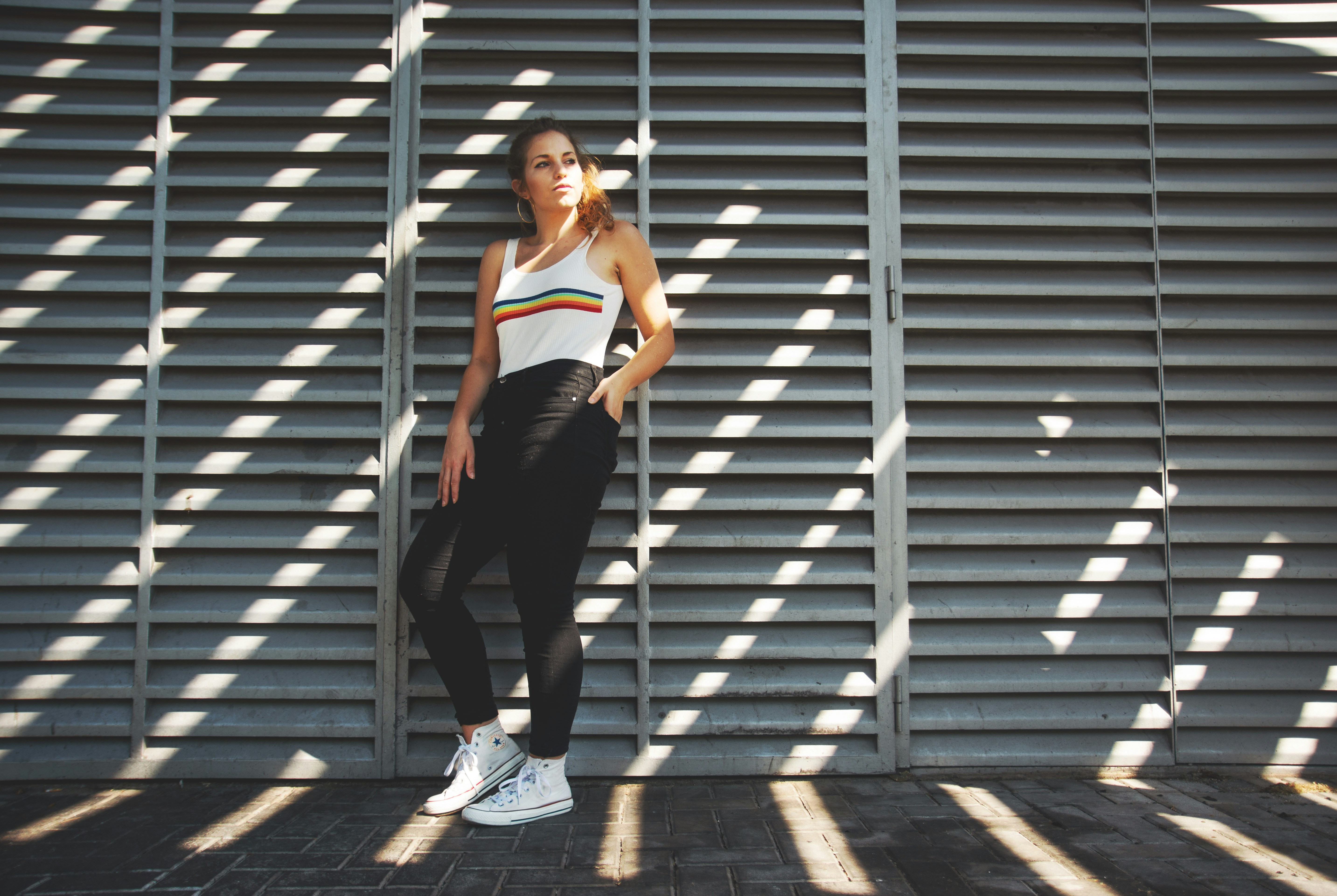 Lady standing by the Wall-  Fall Transition Outfits